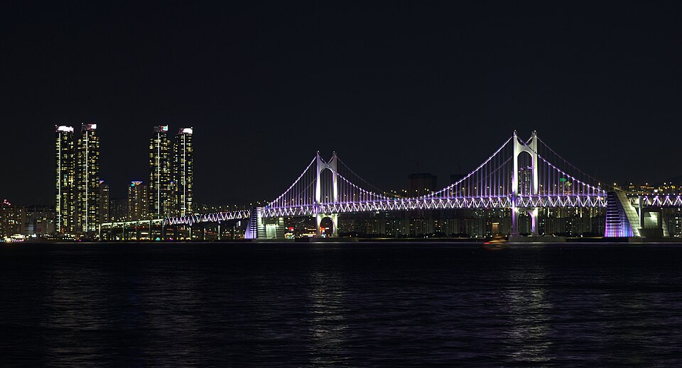 Gwangan Bridge illuminated at night, viewed from Marine City in Busan