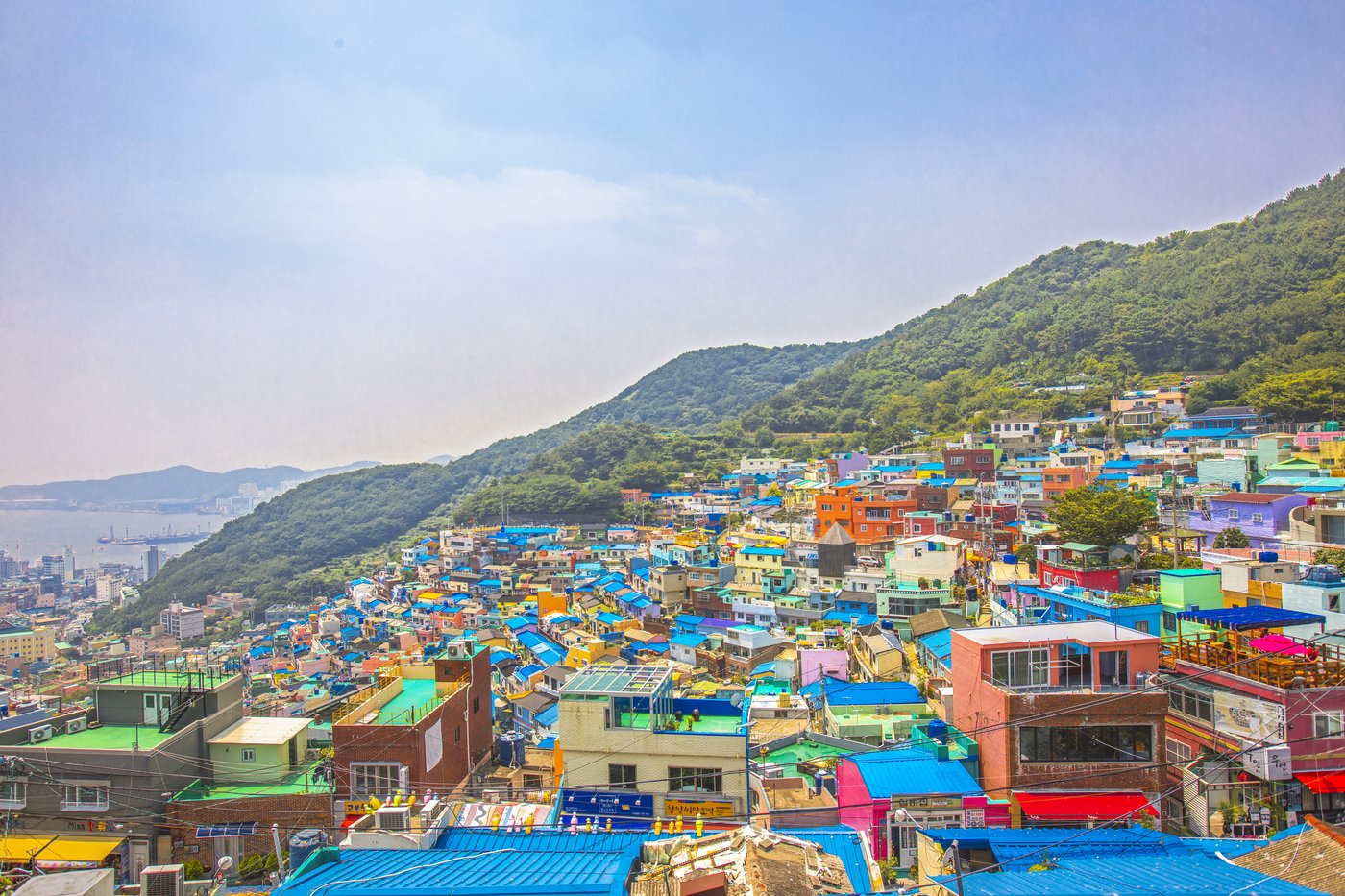 Colourful hillside homes and blue rooftops at Gamcheon Culture Village.