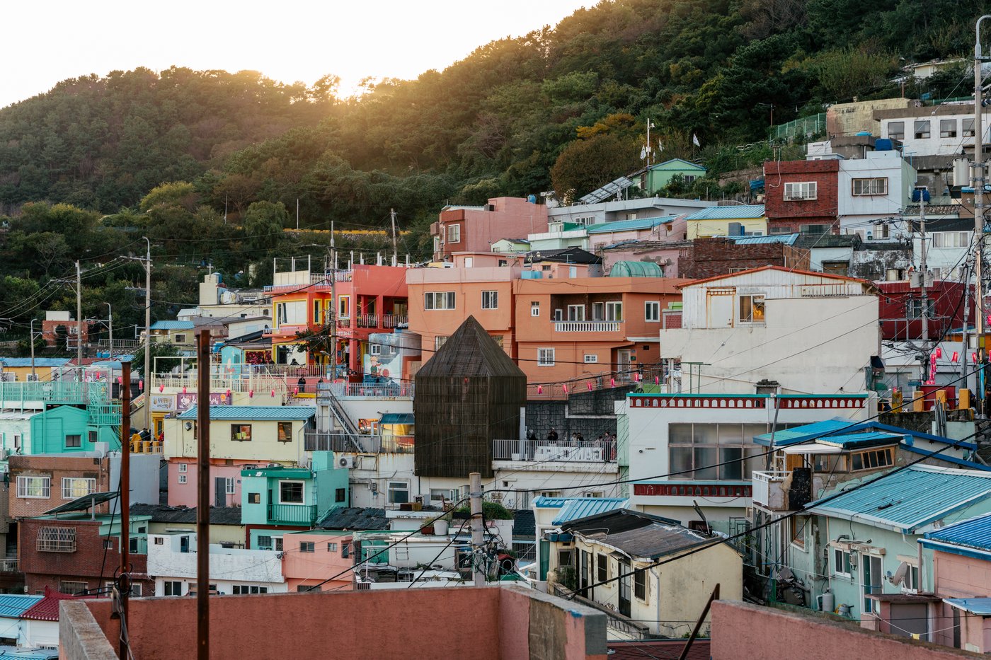 Closely spaced hillside homes and rooftops in Gamcheon Culture Village.