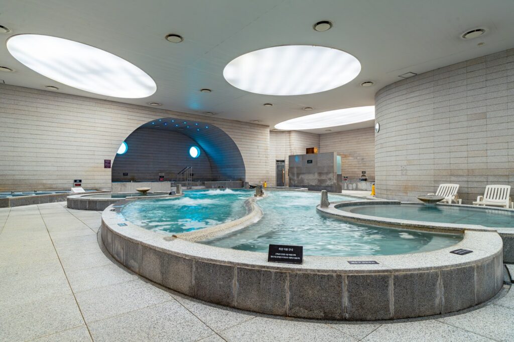 Curved indoor spa baths at Spa Land Centum City
